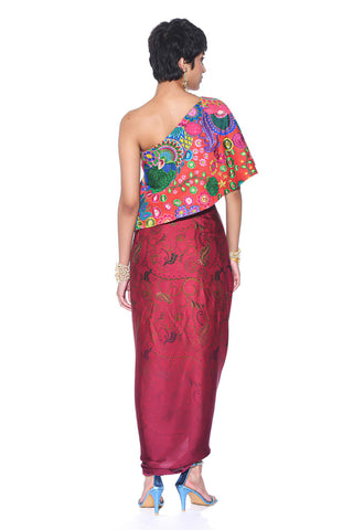 Back look of Crimson Red One-Shoulder colorful printed Top with Maroon Printed Drape Skirt, designed for effortless elegance. Designer women attire for modern contemporary wear.
