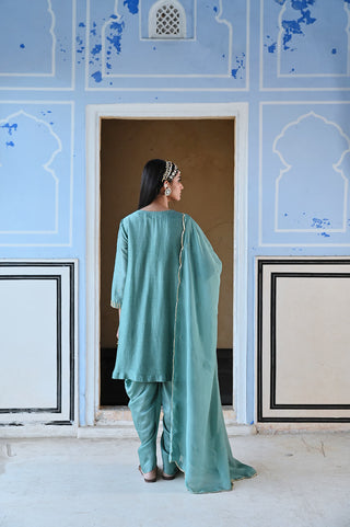 Back look of Turquoise blue embroidered short kurta with dhoti and dupatta. A perfect traditional ethnic dress for wedding ceremonies or events, party wear outfits for women.