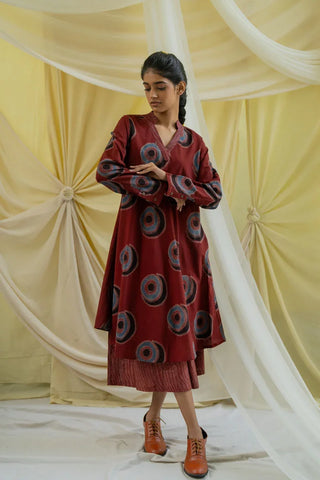 Burgundy hand block printed tunic and culotte co-ord set with long buttoned sleeves, styled pose