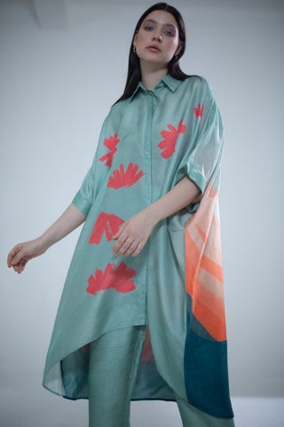 A two piece dupion silk set comprised of abstract geometric and floral print in playful color compositions and parallel pants with fusion textiles. Casual wear, resort, summer holidays, brunch, soiree, Modern kaftan set for women. 