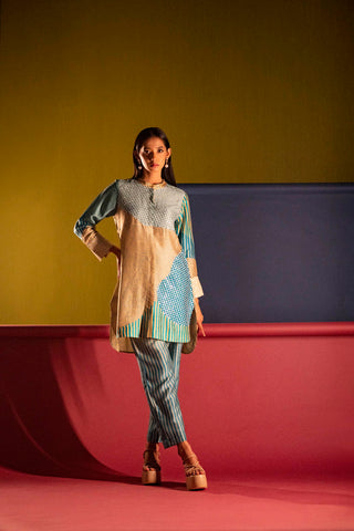 Grandeur silhouette in contemporary print designed in house is a classic and is complimented with mandarin collar and 3/4th sleeves. Casual wear, resort, summer holidays, brunch, soiree, Modern ethnic tunic set for women. Designed by Clos.