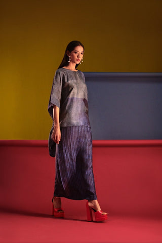 A two piece Kaftan asymmetric tunic paired with uber stylish skirt making it a influencing outfit for the trend. Casual wear, resort, summer holidays, brunch, soiree, everyday wear for women. Designed by Clos.