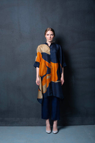 A contemporary co-ord set skillfully crafted in silk with geometric origami elements for that simple yet striking look. Perfect for formal events, resort, summer holidays, brunch, soiree, chic and stylish women's wear. Designed by Clos.