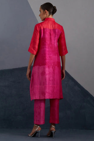 Back look of vermilion and fuchsia tunic paired with straight dupion silk trousers.