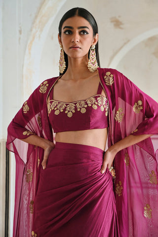 Chic Indo-western three-piece outfit with magenta floral embroidery — includes a statement bralet, jacket, and flowing cowl skirt perfect for celebrations and bridal wedding reception, cocktain party or hens party.