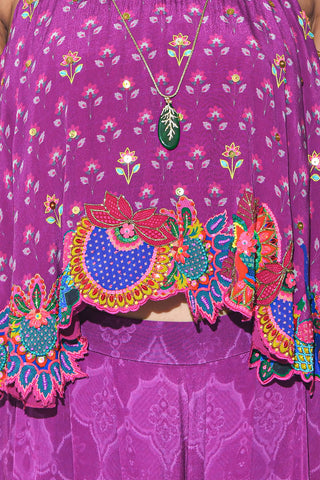Close up of purple embroidered co-ord set.