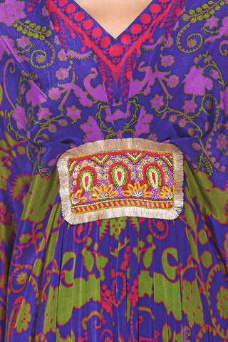 Hand bead embroidery on purple paisley print belt kaftan.