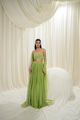Stylish lime jacket set featuring a lime bustier with line embroidery, long embroidered jacket, and flowy sharara for an elegant occasion look. Designed by Ease.