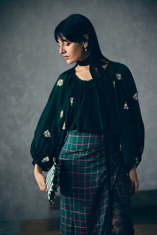 Stylish emerald green check skirt with embroidered solid top and voluminous puff sleeves, modern ethnic outfit for women, suitable for parties, celebrations, and casual wear