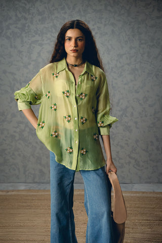 Pista green silk organza shirt with delicate floral motif embroidery, sheer and elegant women’s top perfect for festive wear, parties, and sophisticated modern ethnic styling.