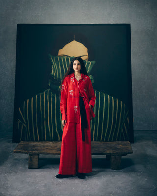 Elegant red co-ord set with printed design and delicate hand embroidery, paired with matching pants, perfect for women’s festive wear, casual outings, and modern ethnic fashion.