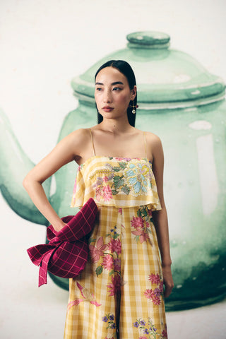 Vibrant yellow printed jumpsuit with artistic design, elegant women’s outfit perfect for casual outings, travel wear, and chic day to evening looks.