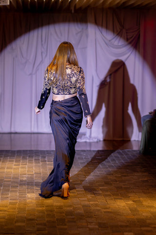 Back look of black full sleeve jaal embroidered crop top and skirt on the  sydney runaway. Cocktail, Partywear bold outfits. Indian Designers at Australian Fashion Grandeur runway.