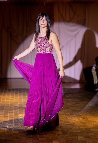 Runway model wearing a floor-length Magenta jaal embroidered Anarkali with dupatta at Australian Fashion Grandeur runway.