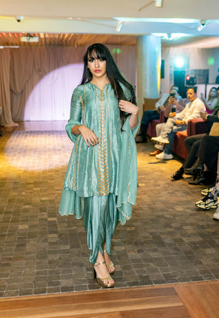 Model wearing Turquoise blue embroidered short kurta with dhoti and dupatta at Australian Fashion Grandeur Show.
