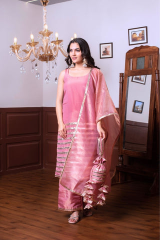 Ghazal peach taffeta silk kurta set with golden patti detailing, women’s designer ethnic wear, elegant festive kurta set perfect for weddings and traditional occasions.