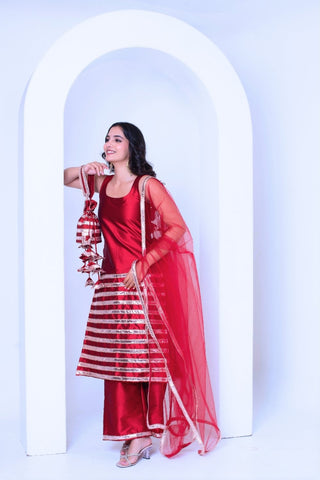 Dupatta and kurta detail view of red silk sleeveless kurta set with golden patti border, Ghazal designer ethnic wear for women, festive outfit with elegant traditional styling.
