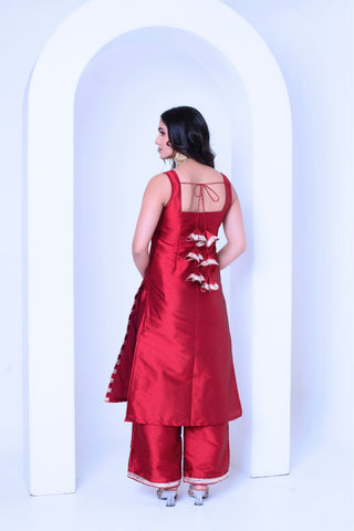 Back look of Ghazal red silk kurta set sleeveless ethnic outfit for women, elegant festive wear suitable for weddings and traditional styling.