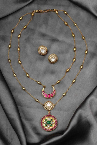 Statement kundan necklace set with intricate design and zircon highlights, crafted in gold finish, perfect for bridal looks, weddings and festive occasions