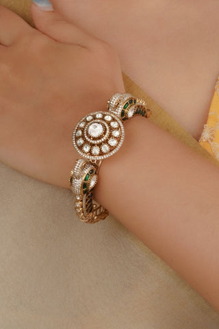 Statement white kangan with intricate design, embellished with moissanite and zircon stones, gold plated with screw fastening for a rich traditional look. Perfect bangles for bridal wear and festive occasions