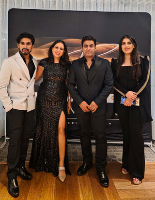 Leela Lane founder photographed with Australian Fashion Grandeur visionaries Anish Sukla, Platin, and Nitin Sukla, celebrating creativity and fashion leadership.