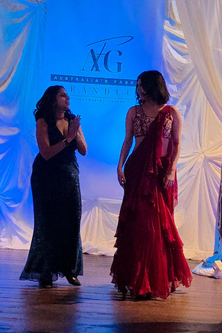 Leela Lane founder with Diana, the showstopper, at the second Australian Fashion Grandeur runway show, highlighting a standout moment from the fashion event.