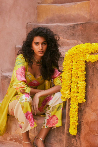 A lime yellow robe jacket set is a perfect resort outfit with crop top and pants. 