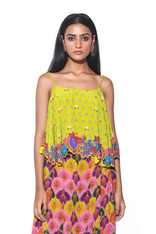 Close up look of lime yellow embroidered crop top with violet
print pleated palazzo. Perfect for cocktail parties, dinner date or bohemian theme parties or for sundown soirees.