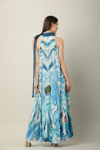 Back look chic-style paisley-printed blue dress with organza neck- tie, perfect for travel diaries, resort vacations, and parties.