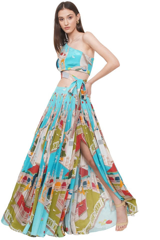 Luxe crepe one-shoulder crop top with delicate embroidery and belt detail, paired with a breezy flared slit skirt - ideal for resort or beach vacations.