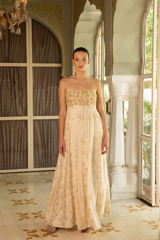 Radiate timeless beauty and a touch of vibrancy in this mesmerizing Ivory Zari Anarkali with Colorful Embroidery and Organza Dupatta Set. This elegant ensemble blends classic Indian design with a touch of modern flair, perfect for making a graceful statement at any special occasion. Designed by Mona and Vishu.
