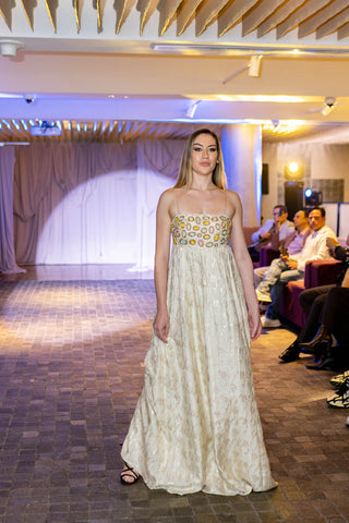 Radiate timeless beauty and a touch of vibrancy in this mesmerizing Ivory Zari Anarkali with Colorful Embroidery and Organza Dupatta Set.  featured on the Australian fashion Grandeur runway.  