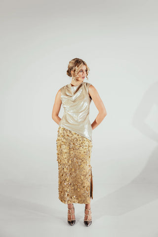  Elena top highlighting its cowl neckline and fluid drape, creating an understated statement piece for polished contemporary outfits and sophisticated styling.