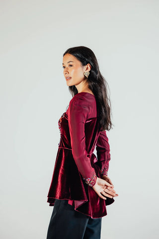 Sasha sculpted silhouette top styled for cocktail dressing, combining a defined waist and graceful proportions for polished contemporary feminine fashion.