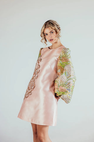 Close look of the Yuri brocade mini dress highlighting its intricate floral brocade texture and refined detailing, showcasing Musou’s contemporary approach to luxury occasionwear.