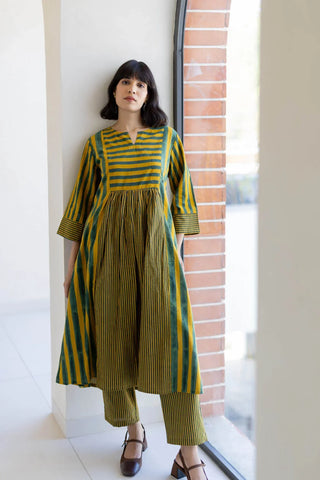 Front view of mustard and green stripe 4 panel kurta and straight pant set
