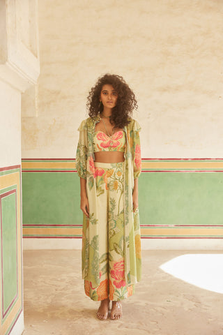 A pastel green and ivory placement jacket set which is a playful delight with its beautiful chantilly lace detailing that elevates its charm. The print is placed in such a way that it radiates a playful color composition all over the set. Get ready with this stylish fit for your airport look, brunches, parties and easy resort days.