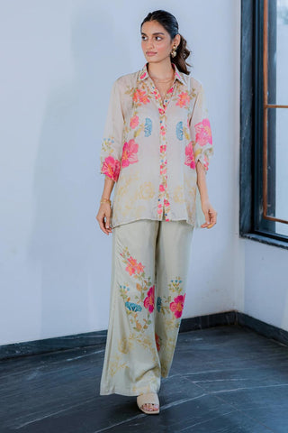 A co–ord set that combines comfort and style effortlessly with a touch of elegance, tailored from pure habutai silk with floral print. Resort wear, brunch to soiree, vacation in stlye, gen-z glam, floaty and fierce and more. Designed by Paulmi and Harsh.