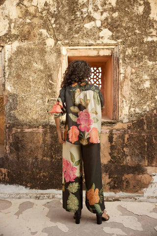 A co–ord set that combines comfort and style effortlessly with a touch of elegance, crafted from pure habutai silk with a striking floral print. Resort wear, brunch to soiree, classy style for women. 