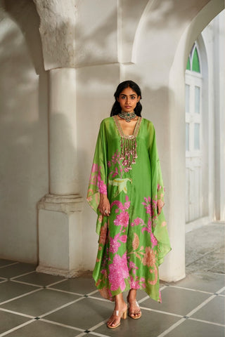 Raye Green Floral Kaftan in silk organza featuring floral print, all-over embroidery, embellished neckline, tassel details, and matching slip.