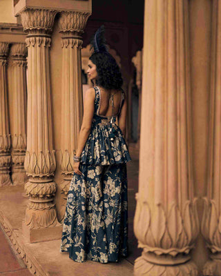 The back of the navy blue peplum set.