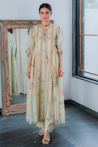A floral and stripe printed kurta with delicate kangri detailing on the neck, perfect for day events, meetings and light celebrations. It is paired with straight pants. Brunch to soiree, festive, ocassion dress designed by Paulmi and Harsh.