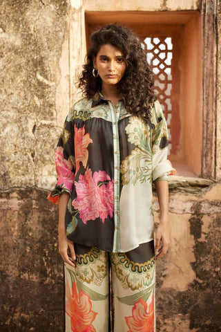 A co–ord set that combines comfort and style effortlessly with a touch of elegance, crafted from pure habutai silk with a striking floral print. Resort wear, brunch to soiree, classy style for women. Designed by Paulmi and Harsh.