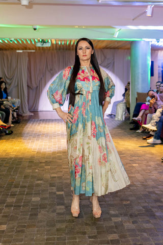 Front-on shot ivory with multicoloured floral print placement maxi dress, crafted from smooth and breathable habutai silk at Australian Fashion Grandeur runway.