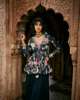 Black floral printed peplum palazzo set. Perfect ethnic yet modern women's wear for special occasions, cocktail parties, wedding for brides and guests. 