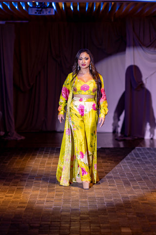 Model in lime yellow jacket set posing at Australian fashion Grandeur Show.
