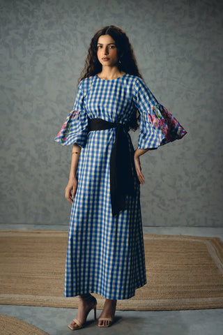 Paulmi and Harsh Yutori Midi Dress featuring an elegant all-over floral print, relaxed midi silhouette and breathable poplin flex fabric, offering effortless comfort with contemporary designer style.