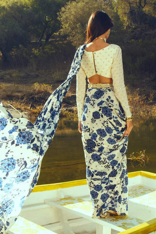 Back look of pre-stitched saree highlighting off-white blouse, fully embroidered with diamond print butti detailing and finished with a concealed back zip for a structured fit.