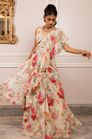 Elegant floral printed saree with hand-embroidered blouse suited for festive occasions and cultural events.
