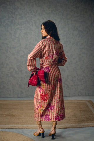 Kanso embroidered shirt paired with a fitted-waist skirt, combining a relaxed shirt silhouette with coordinated floral and check patterns for contemporary womenswear.